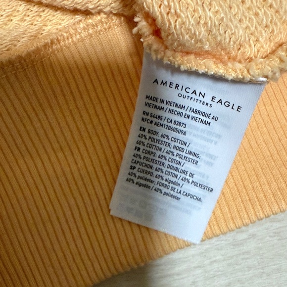 3/$10 American Eagle Outfitters Light Orange Zip-Up Hoodie - Picture 4 of 7